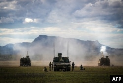 Artillery being fired during joint military drills at a firing range in northern Australia as part of Exercise Talisman Sabre, in Shoalwater Bay on July 22, 2023.