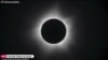 In this screengrab taken on April 20, 2023 from Timeanddate, Perth Observatory, and Learmonth Solar Observatory video footage via AFPTV, the moon blocks out the sun during a full solar eclipse in Western Australia's town of Exmouth.