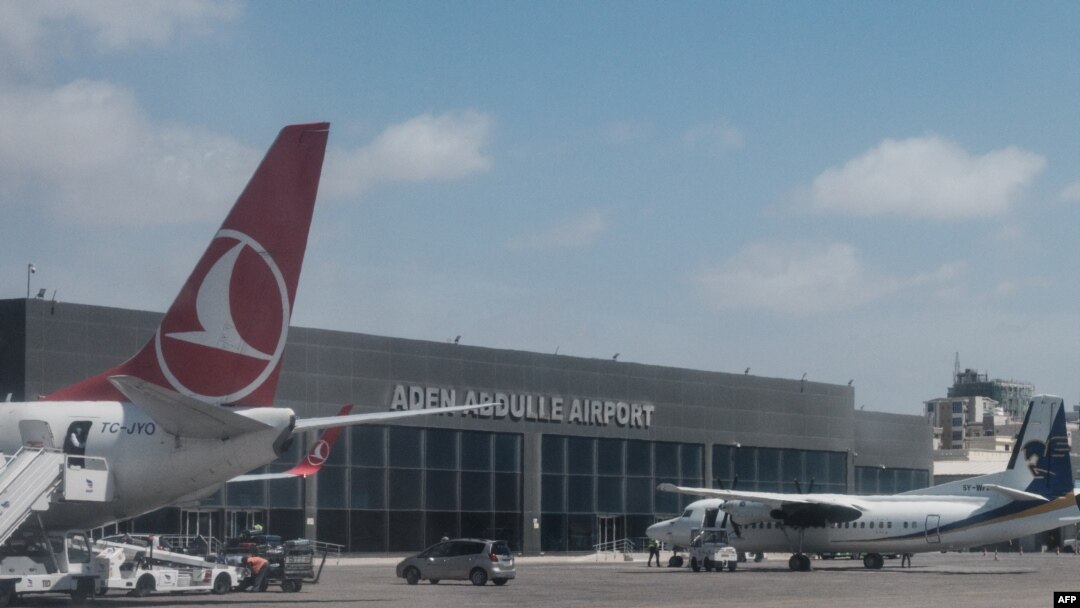 FILE - Airplanes are parked at Aden Adde International Airport in Mogadishu, Somalia, on Feb. 13, 2022.