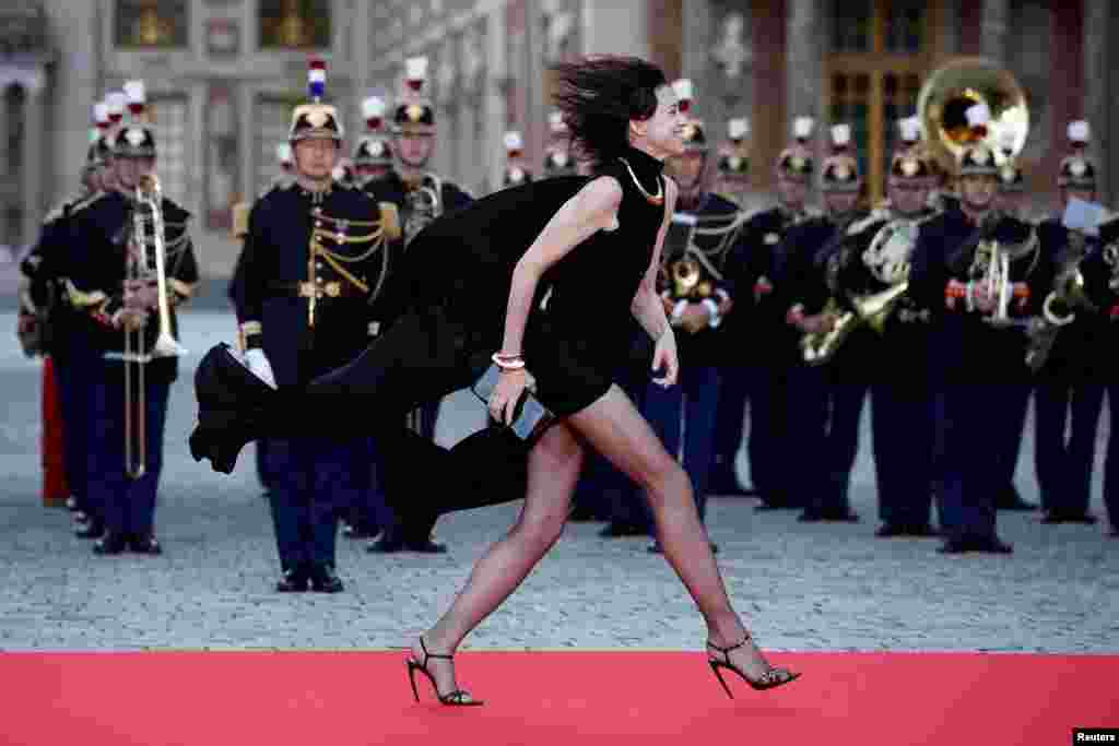 Charlotte Gainsbourg arrives to attend a state dinner in honor of Britain's King Charles and Queen Camilla at the Chateau de Versailles (Versailles Palace) in Versailles, near Paris, on the first day of their State visit to France.