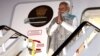 India's Prime Minister Narendra Modi gestures as he arrives at the Sydney international airport on May 22, 2023, to begin his three-day visit to Australia. 