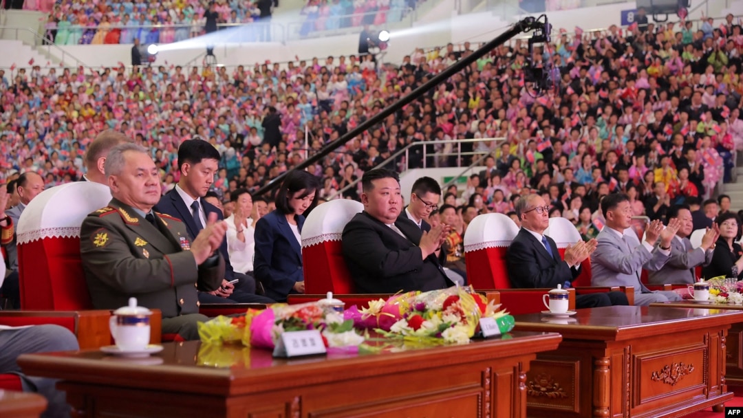 North Korean leader Kim Jong Un (C), Chinese Communist Party politburo member Li Hongzhong (4th R) and Russian Defense Minister Sergei Shoigu (L) attend a war anniversary event in Pyongyang, July 27, 2023. (Korean Central News Agency)