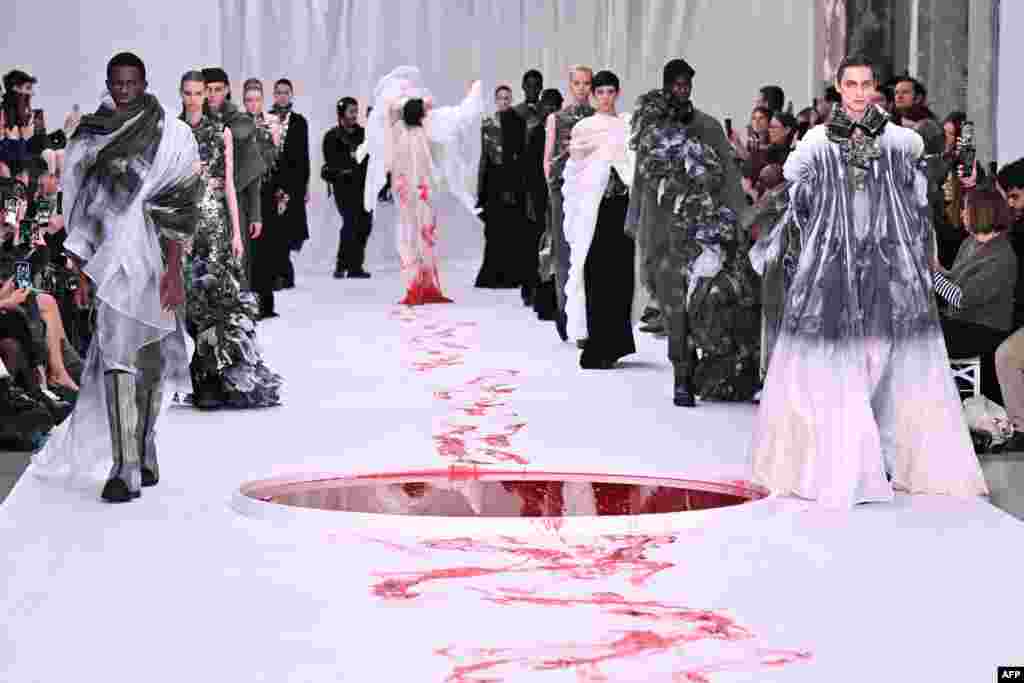 Models present creations by Yuima Nakazato during the Women's Haute-Couture Spring/Summer 2024 Fashion Week in Paris, France.