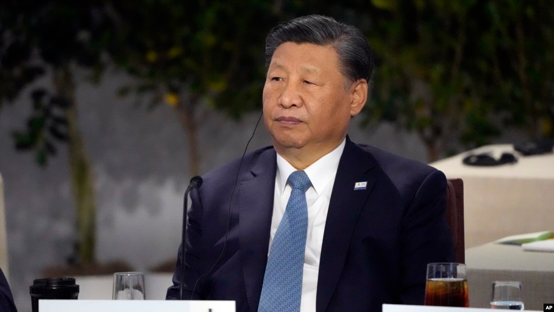 China's President Xi Jinping sits next to other world leaders during the Asia-Pacific Economic Cooperation conference in California, Nov. 16, 2023.
