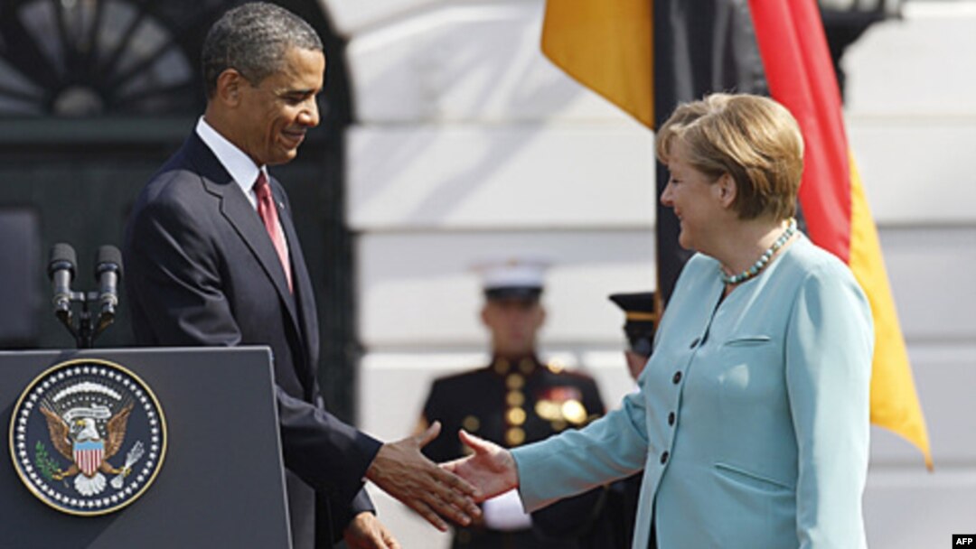 Obama ve Merkel: Kaddafi Gitmeli