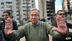 FILE - U.N. Secretary-General Antonio Guterres gestures as he visits Borodianka, outside Kyiv, on April 28, 2022. 