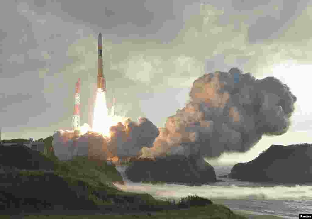 An H-2A rocket carrying Japan's fourth and final quasi-zenith satellite, the Michibiki No. 4, lifts off from the Tanegashima Space Center in Kagoshima Prefecture, southwestern Japan in this photo taken by Kyodo.