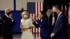 From left, Democratic presidential candidate Joe Biden, his wife, Jill Biden, vice presidential candidate Kamala Harris and her husband, Douglas Emhoff, at Alexis Dupont High School in Wilmington, Delaware, Aug. 12, 2020.