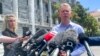 FILE - Chris Hipkins talks to reporters outside parliament in Wellington, New Zealand, Jan. 21, 2022. Since the photo was taken, he has become New Zealand's prime minister.