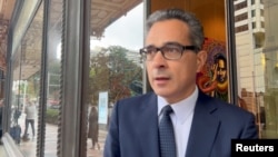 FILE - Dennis Miralis, lawyer for former U.S. military pilot Daniel Duggan, speaks to media outside a court in Sydney, Australia, Nov. 4, 2022, in this screen grab taken from a video. 