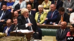 FILE - A handout photograph released by the U.K. Parliament shows Britain's Prime Minister Boris Johnson speaking during his final Prime Minister's Questions at the House of Commons in London on July 20, 2022. 