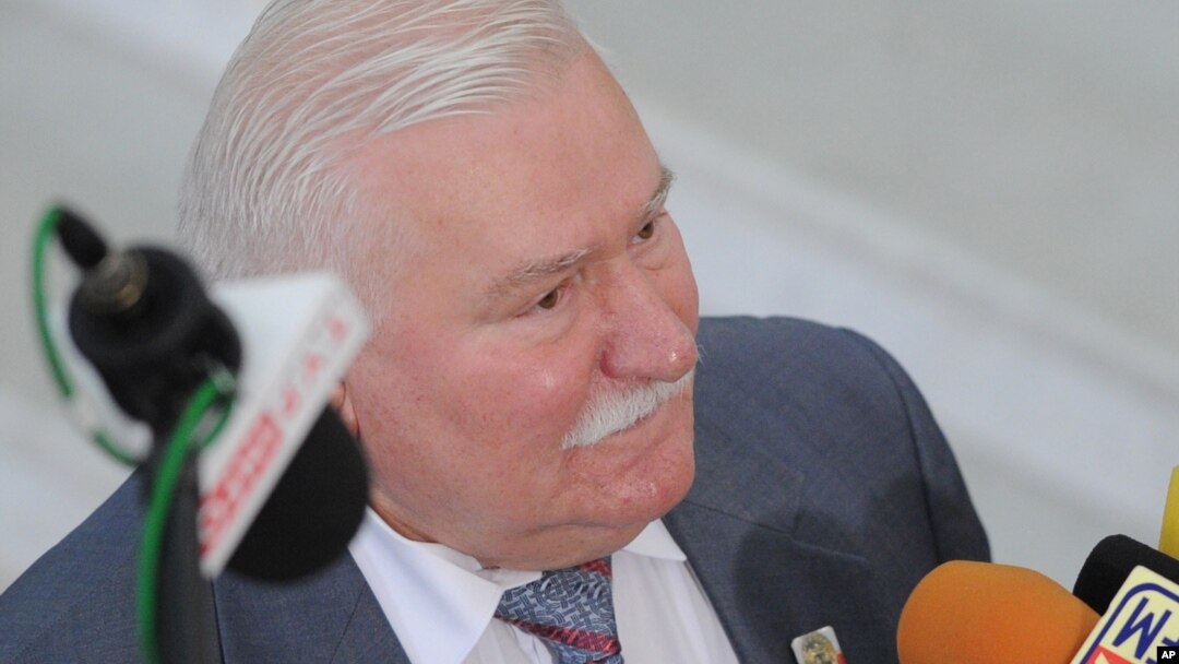 FILE - Former Polish President Lech Walesa speaks to journalists, in Warsaw, Poland, Aug. 6, 2015. Allegations that former president Lech Walesa was a communist-era secret informer have resurfaced after prosecutors seized documents illegally held by a former official's family.