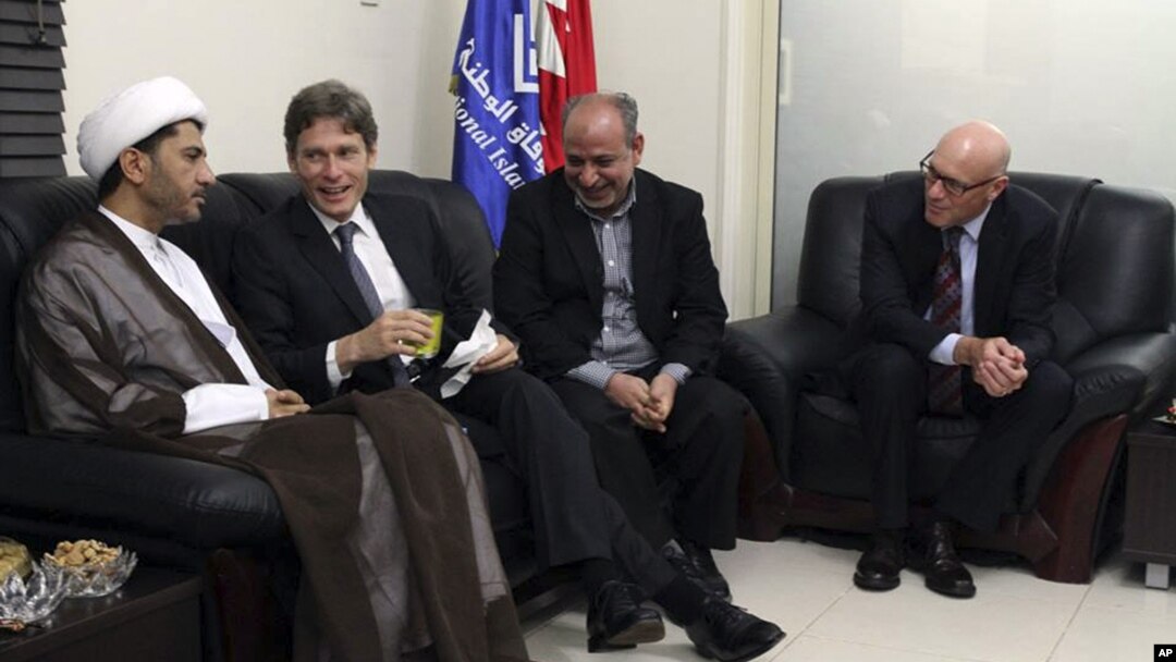 U.S. Assistant Secretary of State for Democracy, Human Rights and Labor Tom Malinowski (2nd L), visits with Sheikh Ali Salman, head of Wifaq National Islamic Society (L), former member of the Bahraini parliament, Abdul Jalil Khalil (2nd R), Timothy J. Pou