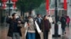 武汉市民采取自我防范措施，预防病毒传染（2020年1月22日）。