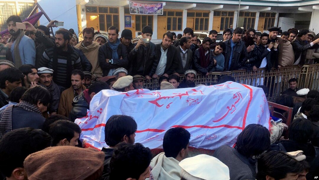 FILE - Pakistanis attend a funeral service for the victims of a bomb blast at a mosque in Parachinar, the capital of Pakistan's northwestern Kurram tribal region, Jan. 21, 2017. 