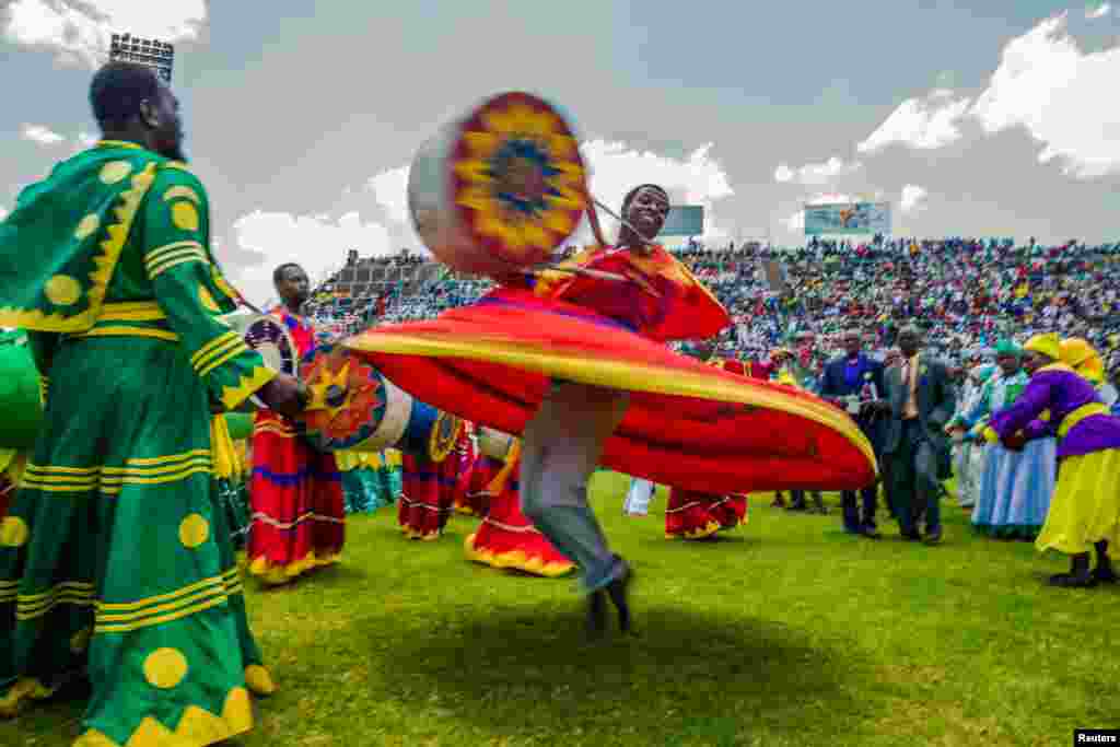 Worshippers and congregants from various indigenous church denominations perform and dance as they wait for Zimbabwe first lady Grace Mugabe (not in picture) to address at a religious gathering rally organized by the ruling party Zimbabwe African National Union - Patriotic Front (Zanu PF) in Harare.