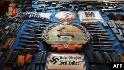 This handout photograph released by the Italian police (Polizia di Stato) of Turin, on July 15, 2019,