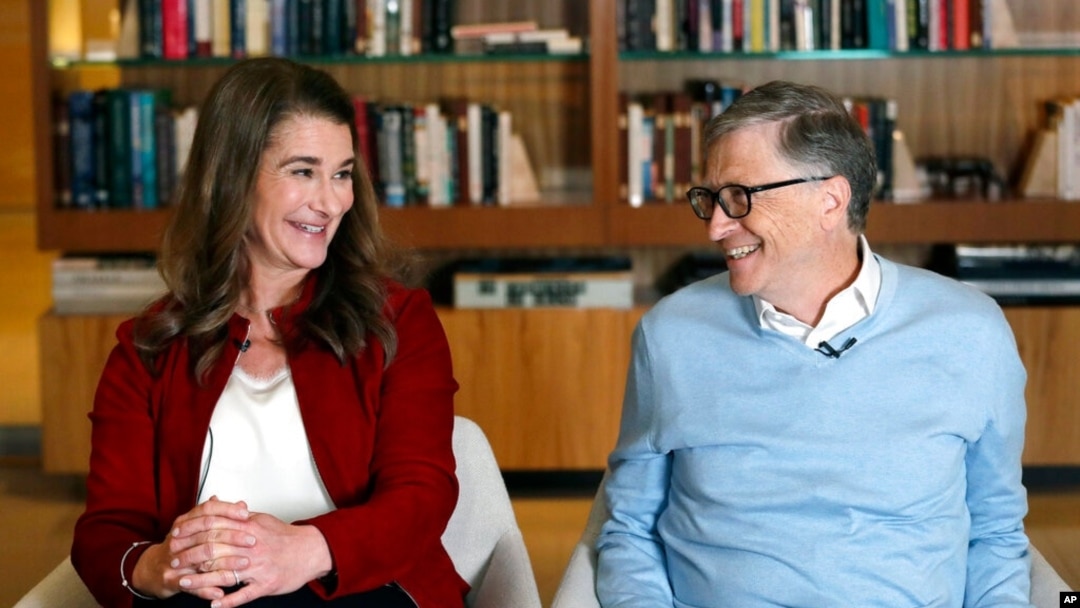 FILE - Bill and Melinda Gates smile at each other during an interview in Kirkland, Wash., Feb. 1, 2019.
