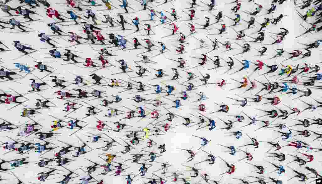 Skiing enthusiasts start in the traditional mass skiing competition "Ski-track of Russia," just outside Moscow, Feb. 9, 2019.