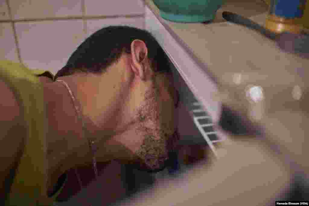 Desperate measures. “When the heat is overwhelming I put my head into the freezer,” said Sanad.