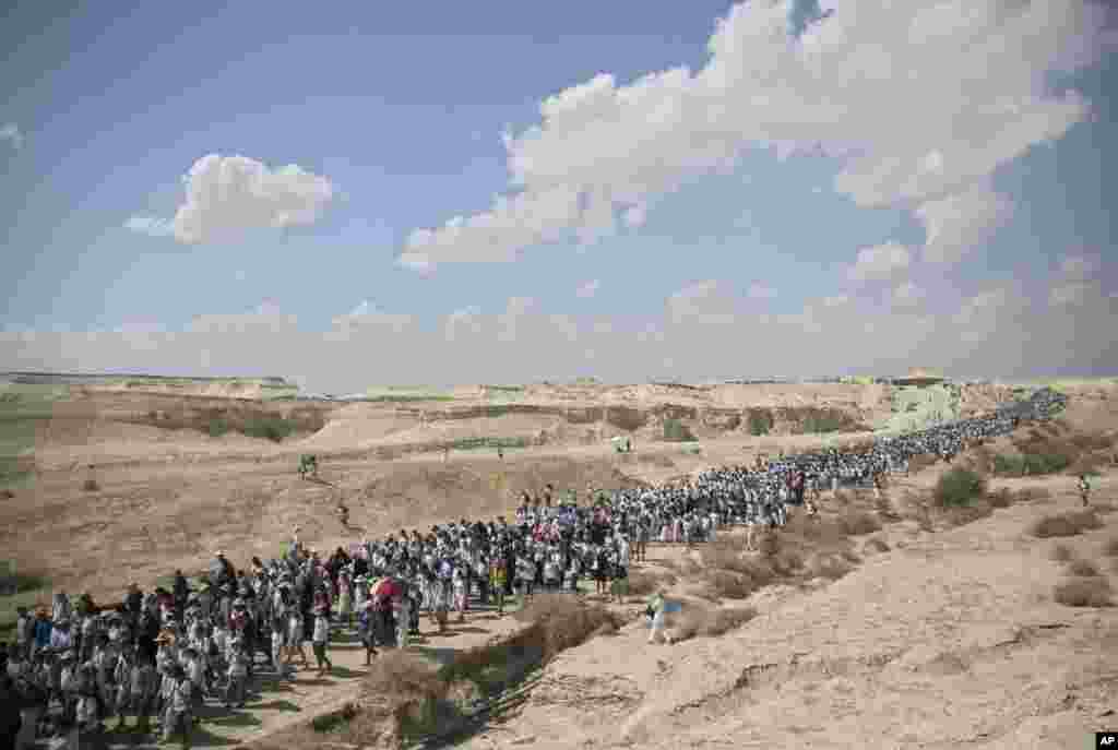 Israeli and Palestinian women participate in a march organized by the "Women Wage Peace" organization, near the Dead Sea. Thousands of women are wrapping up the march around the region, demanding that their leaders act to achieve a peace agreement.