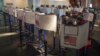 Voters cast their ballots at privacy booths during early voting at the Brooklyn Museum in New York, Oct. 27, 2020.