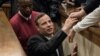FILE - Olympic and Paralympic track star Oscar Pistorius leaves the court after his sentence hearing at the North Gauteng High Court in Pretoria, South Africa, July 6, 2016. 