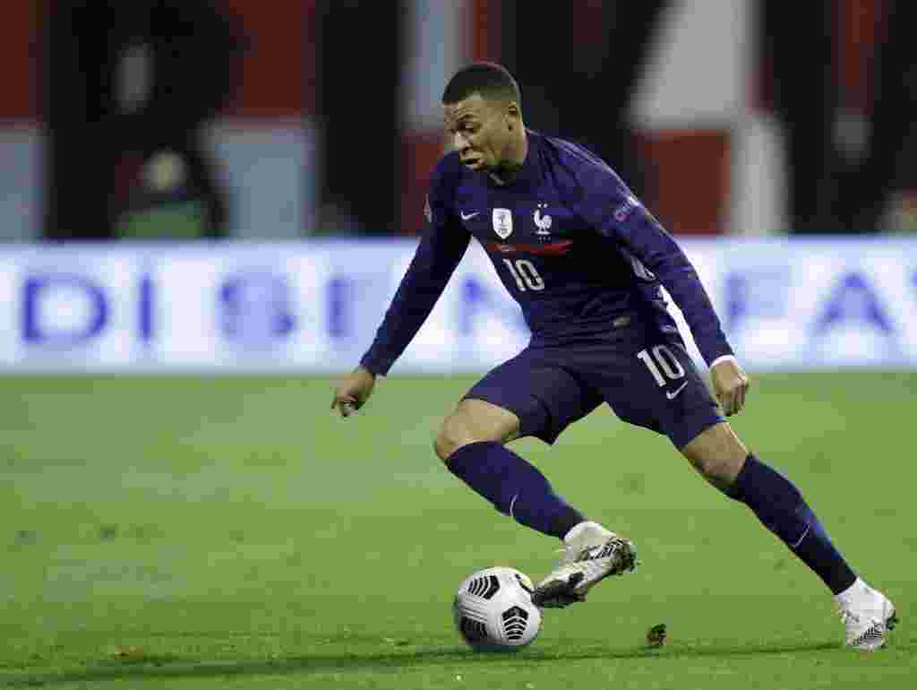 Kylian Mbappé, PSG - Forward - Striker The French Football Federation (FFF) confirmed in early September Paris Saint-Germain and France striker Kylian Mbappé tested positive for COVID-19. Mbappé marked his recovery and return to action with a goal in a 3-0 PSG win over Nice. Photo: France's Kylian Mbappe controls the ball during the UEFA Nations League soccer match between Croatia and France at Maksimir Stadium in Zagreb, Croatia, Wednesday, Oct. 14, 2020. (AP Photo/Darko Bandic)