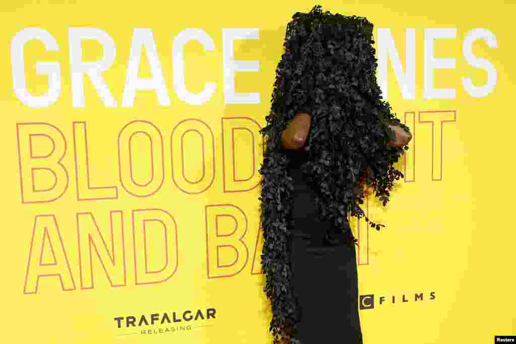 Singer Grace Jones adjusts her hat as she arrives for the UK premiere of her movie "Grace Jones: Bloodlight and Bami" in London, Oct. 25, 2017.
