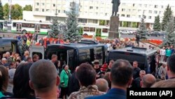 RUSSIA -- People gather for the funerals of five Russian nuclear engineers killed by a rocket explosion in Sarov, August 12, 2019.