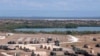 Avoka ap Mennen yon Pwosè pou Anpeche 10 migran Antre nan Guantanamo Bay