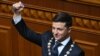 UKRAINE -- Ukrainian President Volodymyr Zelenskiy holds the presidential stamp during his inauguration ceremony at the parliament in Kyiv, May 20, 2019