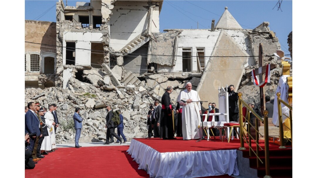 FILE - Pope Francis arrives to pray for the victims of war at Hosh al-Bieaa Church Square in Mosul, Iraq.