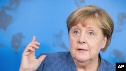 German Chancellor Angela Merkel speaks at a press conference following her visit to the Robert Koch Institute (RKI) in Berlin, Germany, Tuesday, July 13, 2021. Merkel visited the health ministry's leading institute in the Corona pandemic at the…