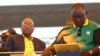 Newly-elected ruling African National Congress (ANC) party president, Cyril Ramaphosa, right, and former ANC president and South African President Jacob Zuma, left, attend the party's 106th birthday celebrations in East London, South Africa, Jan. 13, 2018.