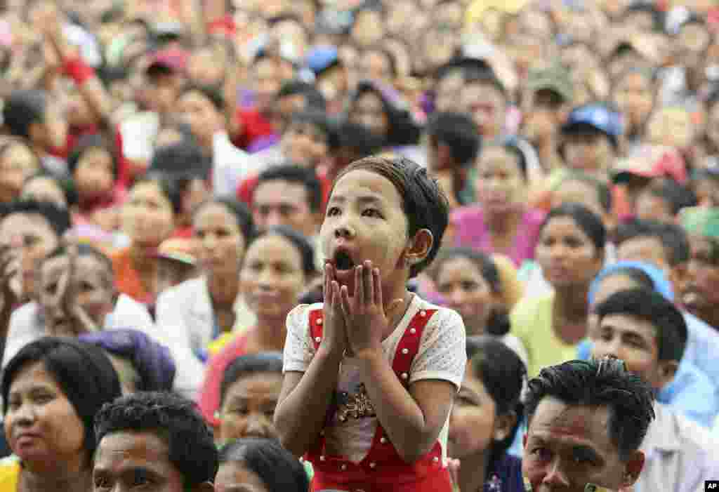 A child reacts during a public rally in support of national leader Aung San Suu Kyi in Naypyitaw, Myanmar.
