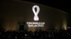 FILE - The tournament's official logo for the 2022 Qatar World Cup is seen on the wall of an amphitheater, in Doha, Qatar, Sept. 3, 2019.