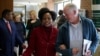 Malcolm McGowan, father of South African Stephen McGowan, who was kidnapped by al-Qaida from Timbuktu in 2011 and has been released and is back home, chats to Foreign Minister Nkoana-Mashabane after a media briefing in Pretoria, August 3, 2017. 