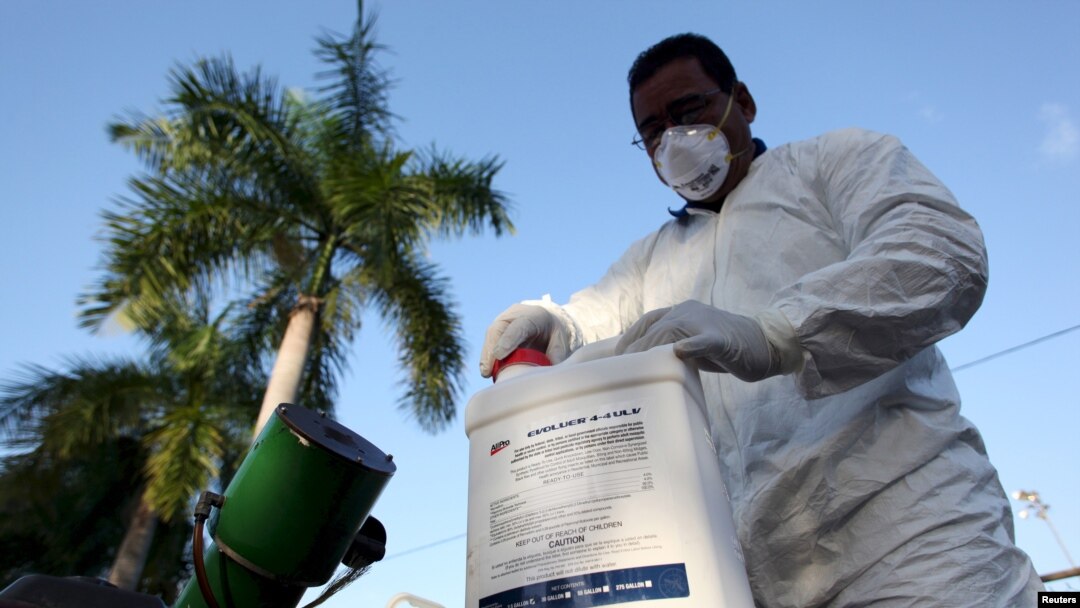 FILE - A health worker prepares insecticide before fumigating a neighborhood in San Juan, Puerto Rico, Jan. 27, 2016. On Friday, an elderly man on the U.S. territory became the first victim of the Zika virus on U.S. soil.