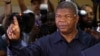 Angola's MPLA main ruling party candidate and defense minister, Joao Lourenco, shows his ink-stained finger after casting his vote in Luanda, Angola, Aug. 23, 2017. Lourenco is the front-runner to succeed President Jose Eduardo dos Santos, who will step down after 38 years in power in an oil-rich country.