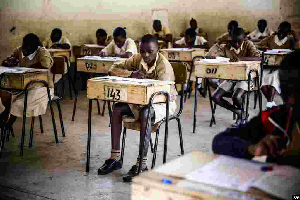 Pupils from the Mathare North Primary School take the Kenya Certificate of Primary Education (KCPE) exam after a return to daily life following post-election turmoil in the Mathare slums of Nairobi, Oct. 31, 2017.
