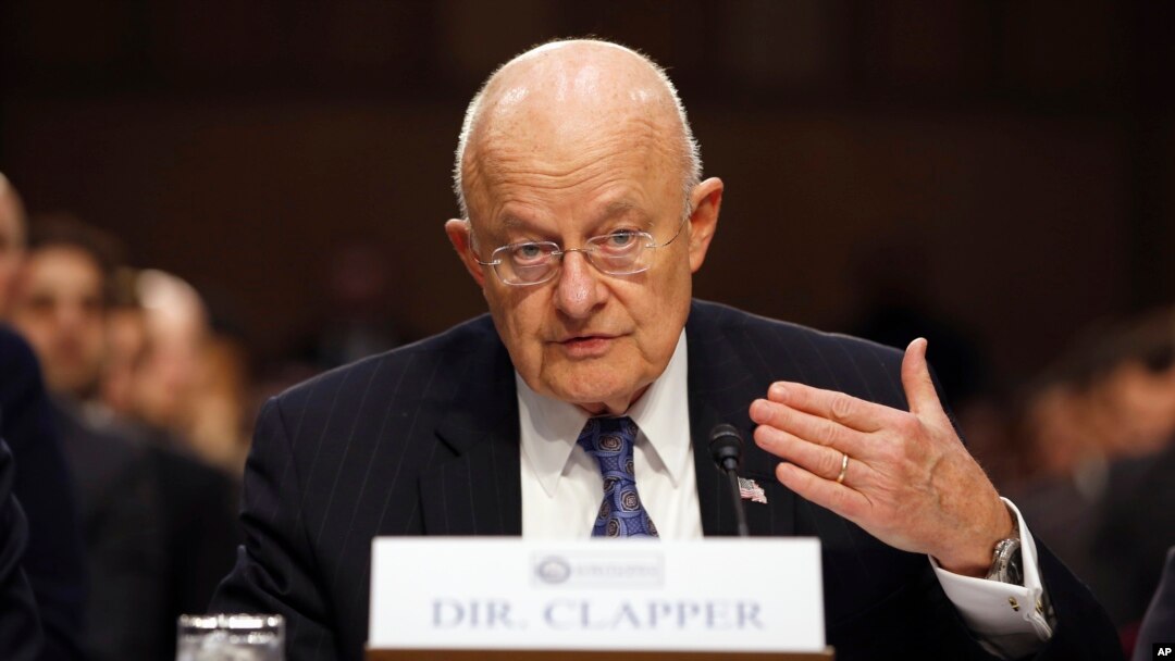 FILE - Director of the National Intelligence James Clapper testifies on Capitol Hill in Washington, Feb. 9, 2016. Even though the bulk collection of Americans' telephone records has ended, calls and emails are still being swept up by U.S. surveillance work targeting foreigners.
