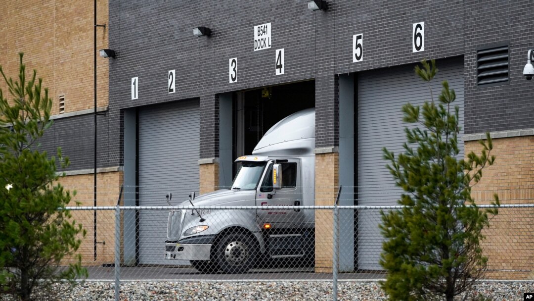 A truck is shown at the Pfizer Global Supply Kalamazoo manufacturing plant in Portage, Mich., Saturday, Dec. 12, 2020. (AP Photo/Paul Sancya)