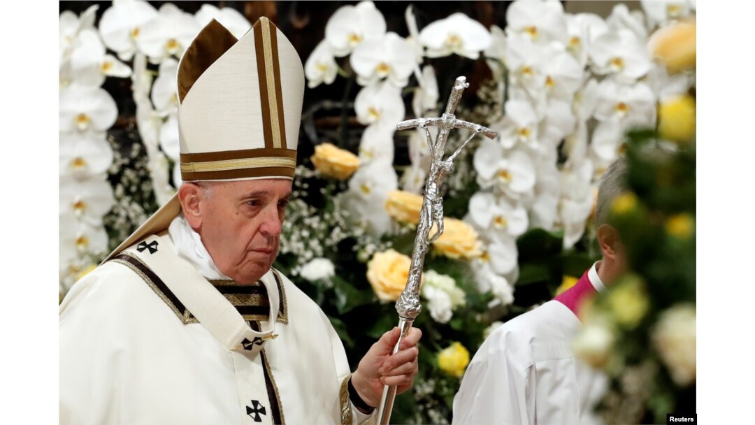 Pope Francis leaves after leading the Easter vigil Mass in Saint Peter's Basilica at the Vatican, April 20, 2019.