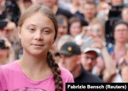 Berlin, Germany - Greta Thunberg / Swedish environmental activist Greta Thunberg attends "Fridays for Future" protest, claiming for urgent measures to combat climate change, in Berlin, Germany, July 19, 2019. REUTERS/Fabrizio Bensch