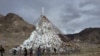 འཁྱག་པའི་མཆོད་རྟེན་བཞེངས་ནས་ཆུ་བསྲི་ཚགས།