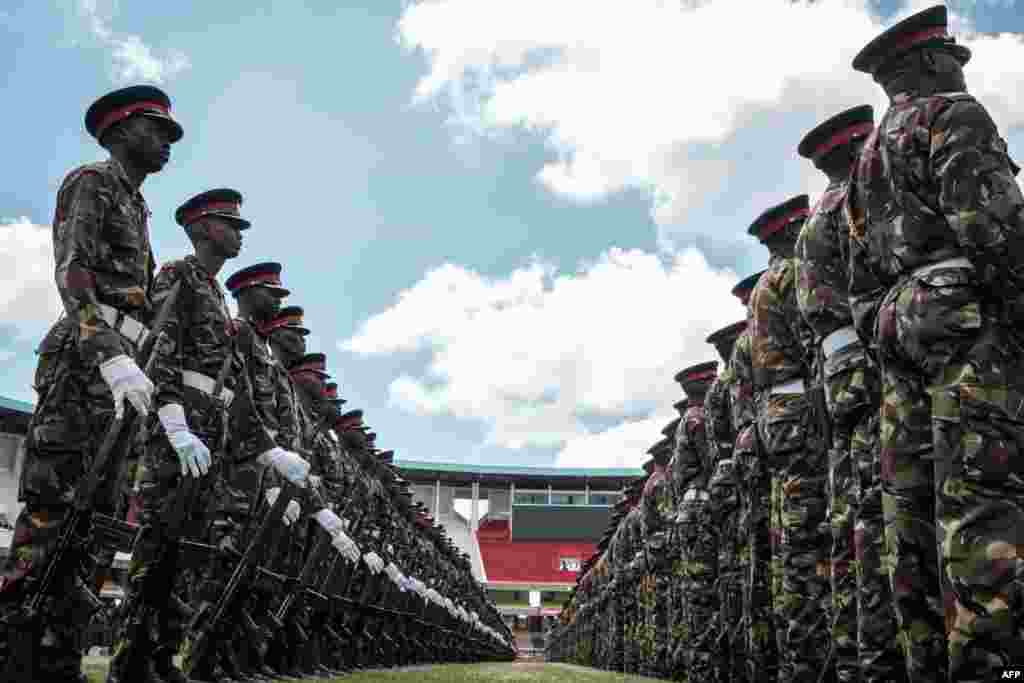 Kenyan army soldiers perform during the rehearsal of the inauguration ceremony of the President at the Moi International Sports Center's Kasarani Stadium in Nairobi.