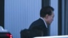 Impeached South Korean President Yoon Suk Yeol arrives at the Corruption Investigation Office for High-ranking Officials in Gwacheon, South Korea, Jan. 15, 2025.