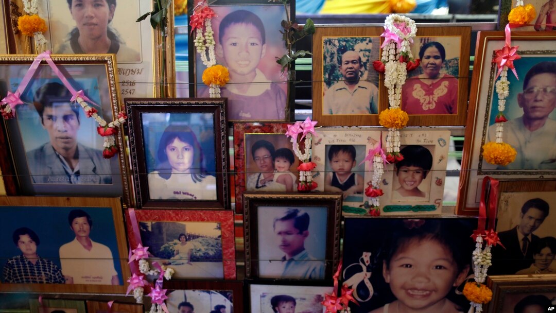 Portraits of victims from the Asian tsunami are displayed during a memorial service, Friday, Dec. 26, 2014 in Phang Nga, Ban Nam Khem province, Thailand.