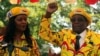 President Robert Mugabe and his wife, Grace, attend a rally of his ruling ZANU-PF party in Harare, Zimbabwe, Nov. 8, 2017. 